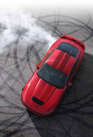 Overhead view of a 2024 Ford Mustang® model with tire tracks on pavement | Jansen Ford of Breese in Breese IL